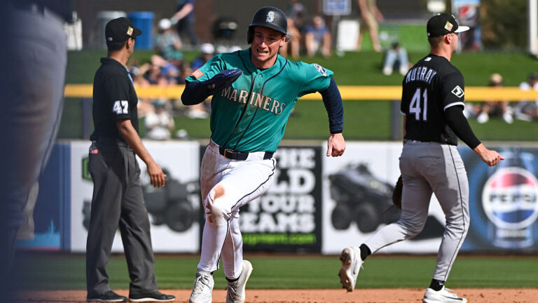 PEORIA, ARIZONA - FEBRUARY 24, 2026: Colt Emerson #85 of the Seattle Mariners runs to third base to score on a two-run double hit by Julio Rodríguez during the fourth inning of a spring training game against the Chicago White Sox at Peoria Stadium on February 24, 2026 in Peoria, Arizona. (Photo by David Durochik/Diamond Images via Getty Images)