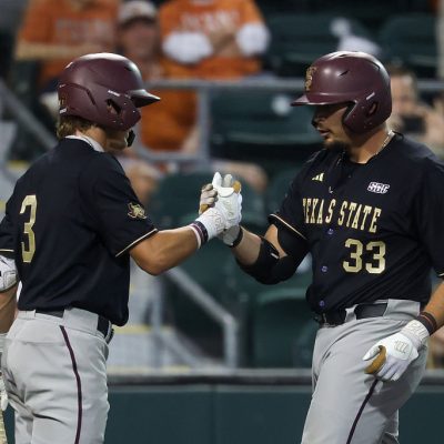 AUSTIN, TX - MARCH 31: Infielder Manny Salas #33 of the Texas State Bobcats gets a high five from teammate infielder Dawson Park #3 of the Texas State Bobcats after hitting a home run during the college baseball game between Texas Longhorns and Texas State Bobcats on March 31, 2026, at UFCU Disch-Falk Field in Austin, Texas. (Photo by David Buono/Icon Sportswire via Getty Images)