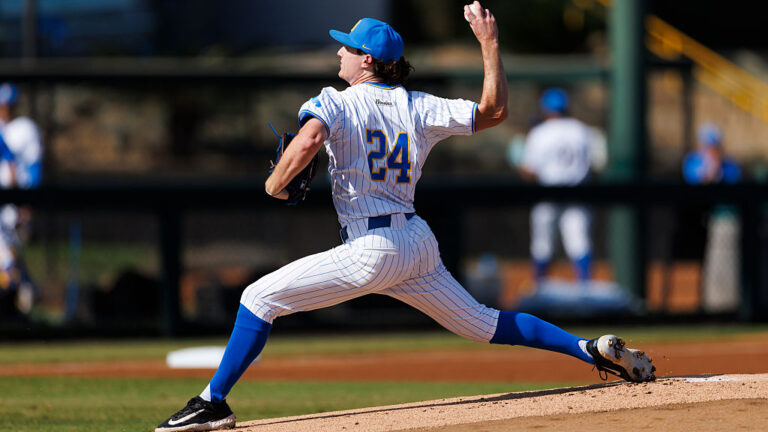 LOS ANGELES, CALIFORNIA - NOVEMBER 1: Logan Reddemann #24 of UCLA Bruins pitches during the game against UC Irvine Anteaters at Jackie Robinson Stadium on November 1, 2025 in Los Angeles, California. (Photo by Ric Tapia/Getty Images)