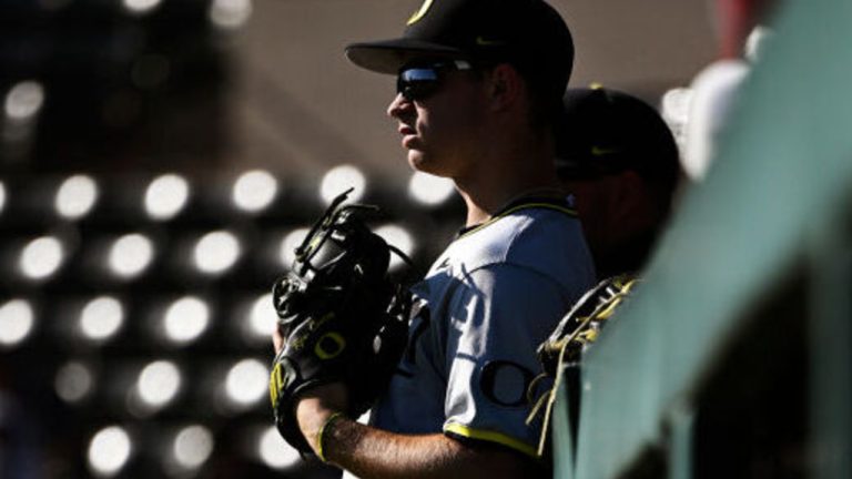 STANFORD, CALIFORNIA - APRIL 19: Ryan Cooney #12 of the Oregon Ducks looks on during warm ups before their game against the Stanford Cardinal at Klein Field at Sunken Diamond on April 19, 2024 in Stanford, California. (Photo by Eakin Howard/Getty Images)