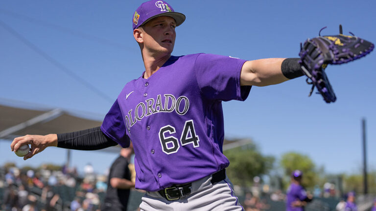MESA, ARIZONA - MARCH 06: T.J. Rumfield #64 of the Colorado Rockies warms up at Hohokam Stadium prior to a game against the Athletics on March 06, 2026 in Mesa, Arizona. (Photo by Kyle Cooper/Colorado Rockies/Getty Images)