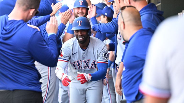 PHILADELPHIA, PA - MARCH 29: Texas Rangers designated hitter Andrew McCutchen celebrates his three run home run during the game between the Philadelphia Phillies and the Texas Rangers on March 29th, 2025 at Citizens Bank Park in Philadelphia, PA. (Photo by Terence Lewis/Icon Sportswire via Getty Images)