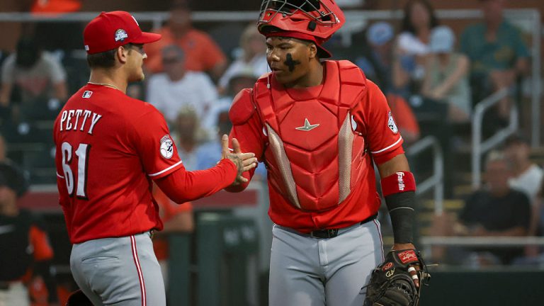 SCOTTSDALE, AZ - MARCH 19: Chase Petty #61 high-fives Alfredo Duno #6 of the Cincinnati Reds during the game between the Cincinnati Reds and the San Francisco Giants at Scottsdale Stadium on Thursday, March 19, 2026 in Scottsdale, Arizona. (Photo by Rob Leiter/MLB Photos via Getty Images)