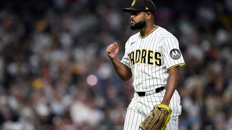 SAN DIEGO, CALIFORNIA - MARCH 28: Randy Vásquez #98 of the San Diego Padres celebrates after inducing a ground ball to end the top of the sixth inning against the Detroit Tigers at Petco Park on March 28, 2026 in San Diego, California. (Photo by Orlando Ramirez/Getty Images)