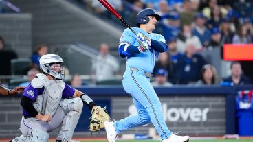 TORONTO, CANADA - MARCH 31: Daulton Varsho #5 of the Toronto Blue Jays swings against the Colorado Rockies during the seventh inning in their MLB game at Rogers Centre on March 31, 2026 in Toronto, Ontario, Canada. (Photo by Mark Blinch/Getty Images)