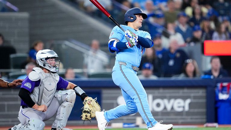 TORONTO, CANADA - MARCH 31: Daulton Varsho #5 of the Toronto Blue Jays swings against the Colorado Rockies during the seventh inning in their MLB game at Rogers Centre on March 31, 2026 in Toronto, Ontario, Canada. (Photo by Mark Blinch/Getty Images)