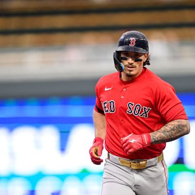 MINNEAPOLIS, MINNESOTA - APRIL 13: Jarren Duran #16 of the Boston Red Sox hits a two-run home run against the Minnesota Twins during the third inning of the game at Target Field on April 13, 2026 in Minneapolis, Minnesota. (Photo by Stephen Maturen/Getty Images)