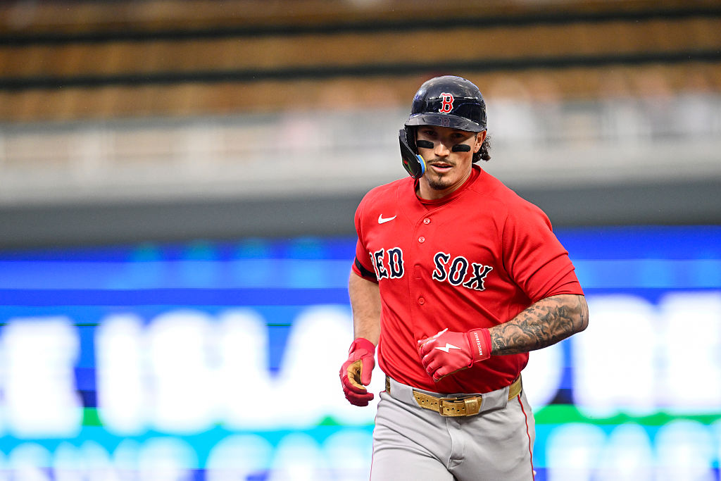 MINNEAPOLIS, MINNESOTA - APRIL 13: Jarren Duran #16 of the Boston Red Sox hits a two-run home run against the Minnesota Twins during the third inning of the game at Target Field on April 13, 2026 in Minneapolis, Minnesota. (Photo by Stephen Maturen/Getty Images)