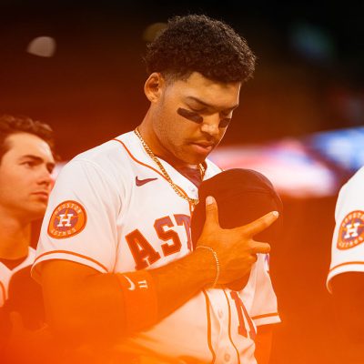 HOUSTON, TEXAS - APRIL 14: Cam Smith #11 of the Houston Astros looks on during the national anthem before the game against the Colorado Rockies at Daikin Park on April 14, 2026 in Houston, Texas. (Photo by Houston Astros/Getty Images)