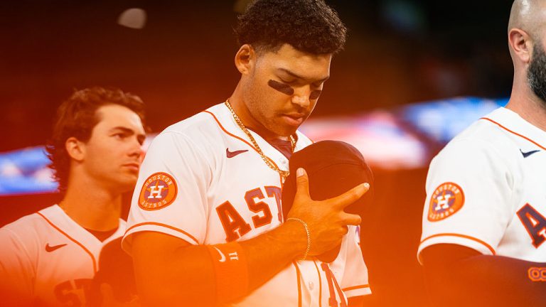 HOUSTON, TEXAS - APRIL 14: Cam Smith #11 of the Houston Astros looks on during the national anthem before the game against the Colorado Rockies at Daikin Park on April 14, 2026 in Houston, Texas. (Photo by Houston Astros/Getty Images)