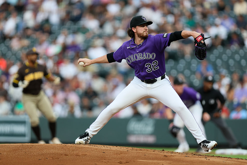 DENVER, CO - APRIL 21: Relief pitcher Chase Dollander #32 of the Colorado Rockies delivers a pitch in the second inning against the San Diego Padres at Coors Field on April 21, 2026 in Denver, Colorado. (Photo by Justin Edmonds/Getty Images)