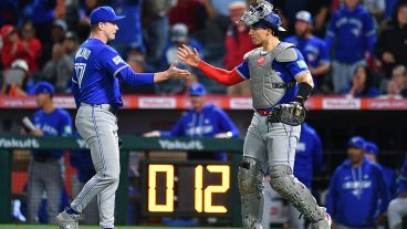 ANAHEIM, CA - APRIL 21: Toronto Blue Jays pitcher Louis Varland (77) celebrates with with Toronto Blue Jays catcher Brandon Valenzuela (59) after the MLB game between the Toronto Blue Jays the Los Angeles Angels on April 21, 2026 at Angel Stadium in Anaheim, CA. (Photo by Brian Rothmuller/Icon Sportswire via Getty Images)
