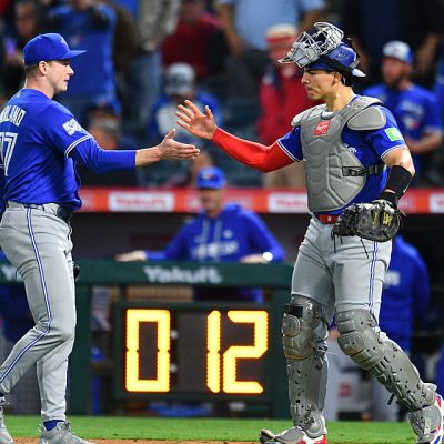 ANAHEIM, CA - APRIL 21: Toronto Blue Jays pitcher Louis Varland (77) celebrates with with Toronto Blue Jays catcher Brandon Valenzuela (59) after the MLB game between the Toronto Blue Jays the Los Angeles Angels on April 21, 2026 at Angel Stadium in Anaheim, CA. (Photo by Brian Rothmuller/Icon Sportswire via Getty Images)