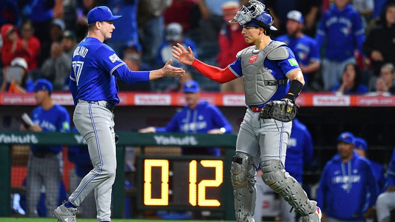 ANAHEIM, CA - APRIL 21: Toronto Blue Jays pitcher Louis Varland (77) celebrates with with Toronto Blue Jays catcher Brandon Valenzuela (59) after the MLB game between the Toronto Blue Jays the Los Angeles Angels on April 21, 2026 at Angel Stadium in Anaheim, CA. (Photo by Brian Rothmuller/Icon Sportswire via Getty Images)