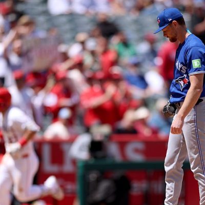 ANAHEIM, CALIFORNIA - APRIL 22: Eric Lauer #56 of the Toronto Blue Jays reacts after giving up a solo home run to Mike Trout #27 of the Los Angeles Angels, to make the score 3-0 Angels during the fifth inning at Angel Stadium of Anaheim on April 22, 2026 in Anaheim, California. (Photo by Harry How/Getty Images)