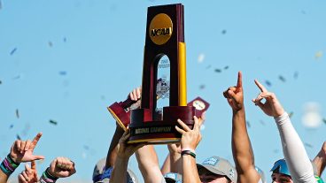 OMAHA, NEBRASKA - JUNE 22: The NCAA College World Series Championship trophy is hoisted after LSU Tigers defeated the Coastal Carolina Chanticleers at Charles Schwab Field on June 22, 2025 in Omaha, Nebraska. (Photo by Jay Biggerstaff/Getty Images)