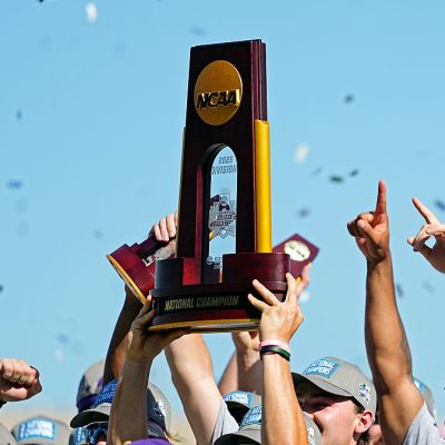 OMAHA, NEBRASKA - JUNE 22: The NCAA College World Series Championship trophy is hoisted after LSU Tigers defeated the Coastal Carolina Chanticleers at Charles Schwab Field on June 22, 2025 in Omaha, Nebraska. (Photo by Jay Biggerstaff/Getty Images)