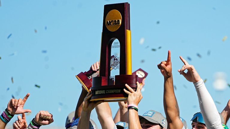 OMAHA, NEBRASKA - JUNE 22: The NCAA College World Series Championship trophy is hoisted after LSU Tigers defeated the Coastal Carolina Chanticleers at Charles Schwab Field on June 22, 2025 in Omaha, Nebraska. (Photo by Jay Biggerstaff/Getty Images)