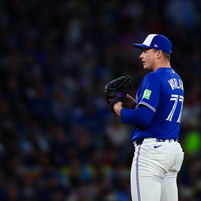 TORONTO, CANADA - APRIL 25: Louis Varland #77 of the Toronto Blue Jays prepares to pitch in the ninth inning of an MLB game against the Cleveland Guardians at Rogers Centre on April 25, 2026 in Toronto, Ontario, Canada. (Photo by Cole Burston/Getty Images)