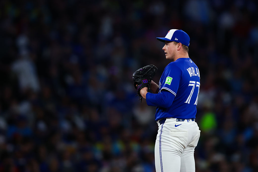 TORONTO, CANADA - APRIL 25: Louis Varland #77 of the Toronto Blue Jays prepares to pitch in the ninth inning of an MLB game against the Cleveland Guardians at Rogers Centre on April 25, 2026 in Toronto, Ontario, Canada. (Photo by Cole Burston/Getty Images)