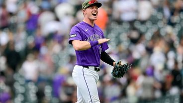 DENVER, CO - May 16: Colorado Rockies right fielder Troy Johnston (20) celebrates the win after a game between the Arizona Diamondbacks and the Colorado Rockies at Coors Field on May 16, 2026 in Denver, Colorado. (Photo by Dustin Bradford/Icon Sportswire via Getty Images)