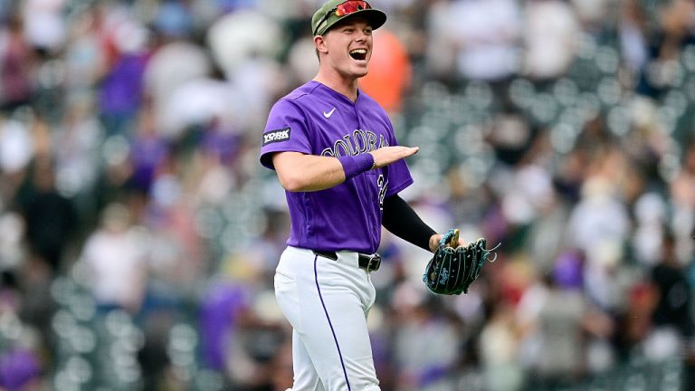 DENVER, CO - May 16: Colorado Rockies right fielder Troy Johnston (20) celebrates the win after a game between the Arizona Diamondbacks and the Colorado Rockies at Coors Field on May 16, 2026 in Denver, Colorado. (Photo by Dustin Bradford/Icon Sportswire via Getty Images)