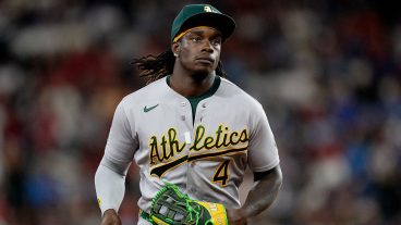 ARLINGTON, TX - APRIL 24: Lawrence Butler #4 of the Athletics jogs to the dugout during the game between the Athletics and the Texas Rangers at Globe Life Field on Friday, April 24, 2026 in Arlington, Texas. (Photo by Courtney Kramer/MLB Photos via Getty Images)
