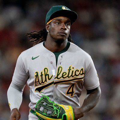 ARLINGTON, TX - APRIL 24: Lawrence Butler #4 of the Athletics jogs to the dugout during the game between the Athletics and the Texas Rangers at Globe Life Field on Friday, April 24, 2026 in Arlington, Texas. (Photo by Courtney Kramer/MLB Photos via Getty Images)