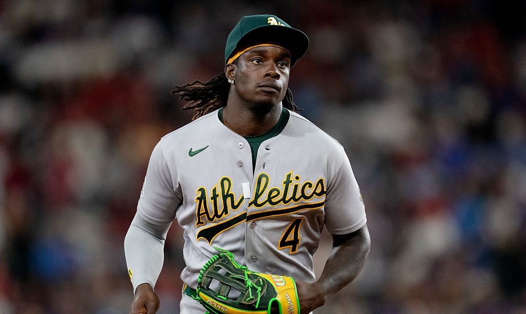 ARLINGTON, TX - APRIL 24: Lawrence Butler #4 of the Athletics jogs to the dugout during the game between the Athletics and the Texas Rangers at Globe Life Field on Friday, April 24, 2026 in Arlington, Texas. (Photo by Courtney Kramer/MLB Photos via Getty Images)