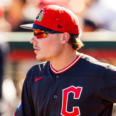 TEMPE, ARIZONA - MARCH 13: Travis Bazzana #72 of the Cleveland Guardians stands in the dugout during the Spring Training game against the Los Angeles Angels at Tempe Diablo Stadium on March 13, 2026 in Tempe, Arizona. (Photo by John E. Moore III/Getty Images)