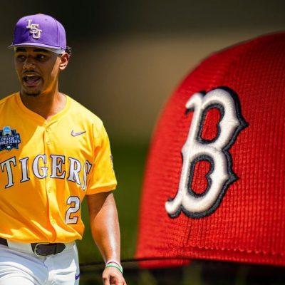 OMAHA, NEBRASKA - JUNE 22: Anthony Eyanson #24 of the LSU Tigers walks off the field in Game 2 of the NCAA College World Series baseball finals against the Coastal Carolina Chanticleers at Charles Schwab Field on June 22, 2025 in Omaha, Nebraska. (Photo by Jay Biggerstaff/Getty Images) / FT. MYERS, FLORIDA - FEBRUARY 15: A hat is displayed as the sun rises during a Boston Red Sox spring training team workout on February 15, 2024 at jetBlue Park at Fenway South in Fort Myers, Florida. (Photo by Billie Weiss/Boston Red Sox/Getty Images)
