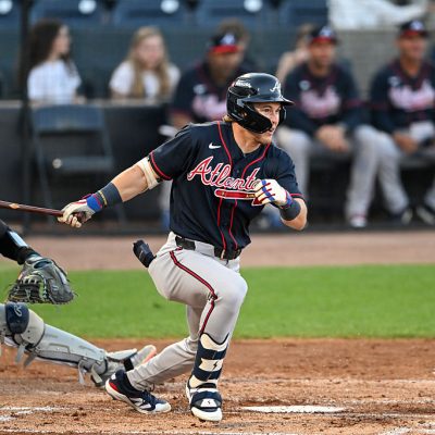 TAMPA, FLORIDA - MARCH 21, 2026: Eric Hartman #64 of the Atlanta Braves hits a single during the second inning of a spring training Spring Breakout game against the New York Yankees at George M. Steinbrenner Field on March 21, 2026 in Tampa, Florida. (Photo by Nick Cammett/Diamond Images via Getty Images)