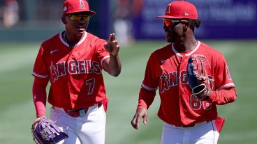 TEMPE, AZ - MARCH 19: Nelson Rada #7 and Raudi Rodriguez #88 of the Los Angeles Angels talk during the game between the Cleveland Guardians and the Los Angeles Angels at Tempe Diablo Stadium on Thursday, March 19, 2026 in Tempe, Arizona. (Photo by Aryanna Frank/MLB Photos via Getty Images)