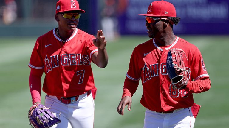 TEMPE, AZ - MARCH 19: Nelson Rada #7 and Raudi Rodriguez #88 of the Los Angeles Angels talk during the game between the Cleveland Guardians and the Los Angeles Angels at Tempe Diablo Stadium on Thursday, March 19, 2026 in Tempe, Arizona. (Photo by Aryanna Frank/MLB Photos via Getty Images)