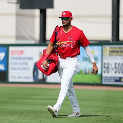 JUPITER, FL - MARCH 19: Joshua Baez #27 of the St. Louis Cardinals walks to the dugout prior to the game between the Washington Nationals and the St. Louis Cardinals at Roger Dean Chevrolet Stadium on Thursday, March 19, 2026 in Jupiter, Florida. (Photo by Jared Blais/MLB Photos via Getty Images)