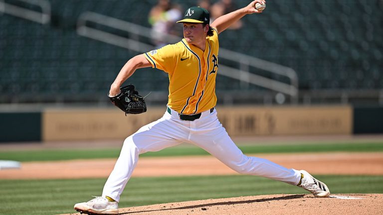 MESA, ARIZONA - MARCH 22, 2026: Jamie Arnold #32 of the Athletics throws a pitch during the first inning of a spring training Spring Breakout game against the Milwaukee Brewers at Hohokam Stadium on March 22, 2026 in Mesa, Arizona. (Photo by Chris Bernacchi/Diamond Images via Getty Images)