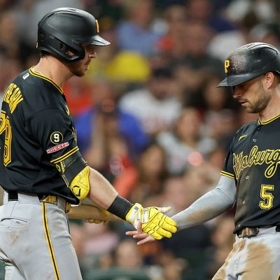 HOUSTON, TEXAS - JUNE 04: Brandon Lowe #5 of the Pittsburgh Pirates celebrates scoring a run with Ryan O'Hearn #29 in the sixth inning against the Houston Astros at Daikin Park on June 04, 2026 in Houston, Texas. (Photo by Tim Warner/Getty Images)