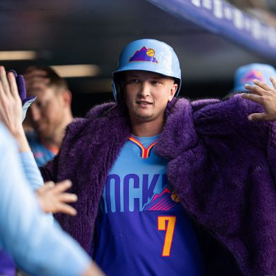 DENVER, COLORADO - JUNE 19: TJ Rumfield #7 of the Colorado Rockies celebrate sin his dugout after hitting a home run in a game against the Pittsburgh Pirates at Coors Field on June 19, 2026 in Denver, Colorado. (Photo by Kyle Cooper/Colorado Rockies/Getty Images)