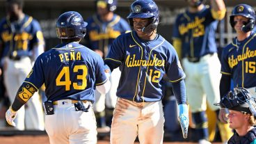 PHOENIX, ARIZONA - MARCH 20, 2026: Luis Peña #43 and Jesús Made #12 of the Milwaukee Brewers celebrate a three-run home run hit by Peña during the sixth inning of a spring training Spring Breakout game against the Seattle Mariners at American Family Fields of Phoenix on March 20, 2026 in Phoenix, Arizona. (Photo by Chris Bernacchi/Diamond Images via Getty Images)