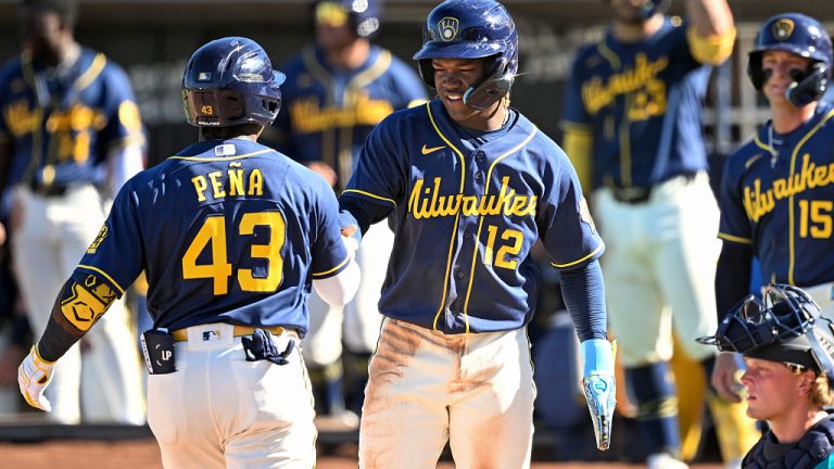 PHOENIX, ARIZONA - MARCH 20, 2026: Luis Peña #43 and Jesús Made #12 of the Milwaukee Brewers celebrate a three-run home run hit by Peña during the sixth inning of a spring training Spring Breakout game against the Seattle Mariners at American Family Fields of Phoenix on March 20, 2026 in Phoenix, Arizona. (Photo by Chris Bernacchi/Diamond Images via Getty Images)