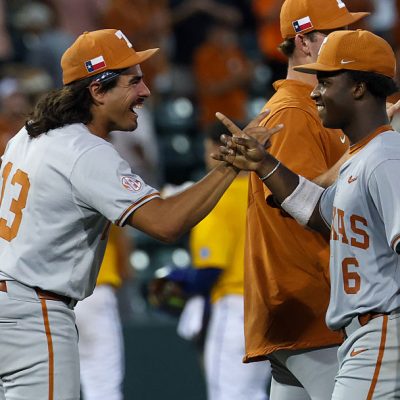 AUSTIN, TX - MAY 31: Pitcher Ruger Riojas #13 of the Texas Longhorns and outfielder Anthony Pack Jr. #6 of the Texas Longhorns high five each other after winning the NCAA Division I Regional game between Texas Longhorns and UC Santa Barbara Gauchos on May 31, 2026, at UFCU Disch-Falk Field in Austin, TX. (Photo by David Buono/Icon Sportswire via Getty Images)