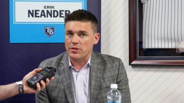 TAMPA, FL - FEBRUARY 15: President of baseball operations Erik Neander of the Tampa Bay Rays talks with a media member during the 2024 Grapefruit League Spring Training Media Day at George M. Steinbrenner Field on Thursday, February 15, 2024 in Tampa, Florida. (Photo by Mike Carlson/MLB Photos via Getty Images)