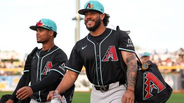 PEORIA, ARIZONA - FEBRUARY 27: Anderdson Rojas #40, left, and Manuel Peña #6 of the Arizona Diamondbacks take the field before the spring training game against the Seattle Mariners at Peoria Stadium on February 27, 2026 in Peoria, Arizona. (Photo by Mike Christy/Getty Images)