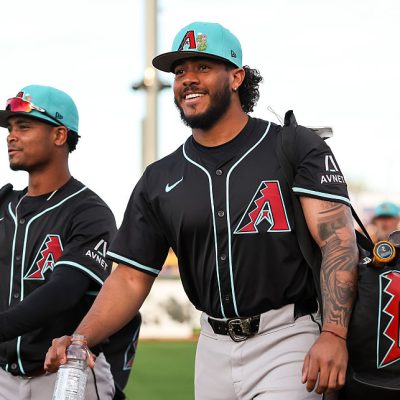 PEORIA, ARIZONA - FEBRUARY 27: Anderdson Rojas #40, left, and Manuel Peña #6 of the Arizona Diamondbacks take the field before the spring training game against the Seattle Mariners at Peoria Stadium on February 27, 2026 in Peoria, Arizona. (Photo by Mike Christy/Getty Images)