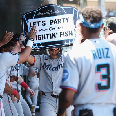 SACRAMENTO, CALIFORNIA - JULY 05: Heriberto Hernandez #13 of the Miami Marlins celebrates in the dugout after hitting a solo home run in the top of the first inning against the Athletics at Sutter Health Park on July 05, 2026 in Sacramento, California. (Photo by Lachlan Cunningham/Getty Images)
