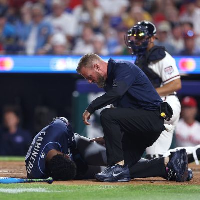 PHILADELPHIA, PENNSYLVANIA - JULY 14: Junior Caminero #13 of the Tampa Bay Rays seeks medical attention after being hit by a pitch during the third inning of the 2026 MLB All-Star Game at Citizens Bank Park on July 14, 2026 in Philadelphia, Pennsylvania. (Photo by Emilee Chinn/Getty Images)
