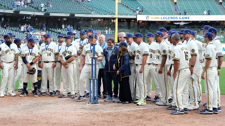 MILWAUKEE, WISCONSIN - JULY 24: Players from both teams take a group picture after the Milwaukee Brewers 25th Anniversary Alumni Game at American Family Field on July 24, 2026 in Milwaukee, Wisconsin. (Photo by John Fisher/Getty Images)