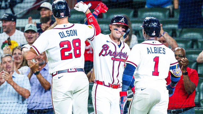 ATLANTA, GA - JULY 06: Matt Olson #28 of the Atlanta Braves celebrates with Mauricio Dubón #14 of the Atlanta Braves after hitting a two-run home run in the ninth inning during the game against the New York Mets at Truist Park on July 6, 2026 in Atlanta, Georgia. (Photo by Jack Casey/Atlanta Braves/Getty Images)