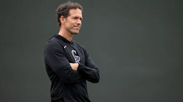SCOTTSDALE, ARIZONA - FEBRUARY 13: Colorado Rockies President of Baseball Operations Paul DePodesta looks on as pitchers participate in the second day of spring training workouts at Salt River Fields at Talking Stick on February 13, 2026 in Scottsdale, Arizona. (Photo by Kyle Cooper/Colorado Rockies/Getty Images)