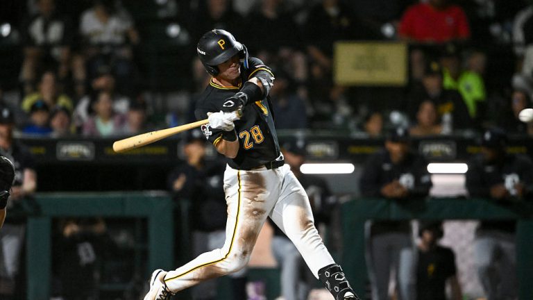 BRADENTON, FLORIDA - MARCH 20, 2026: Easton Carmichael #28 of the Pittsburgh Pirates hits a solo home run during the third inning of a spring training Spring Breakout game against the Detroit Tigers at LECOM Park on March 20, 2026 in Bradenton, Florida. (Photo by Nick Cammett/Diamond Images via Getty Images)